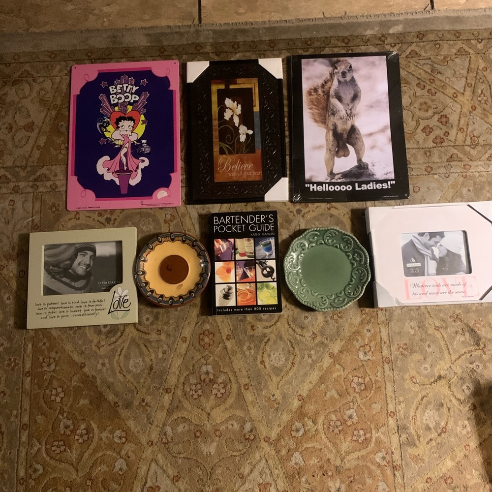 Assorted Decorative Wall Art and Books